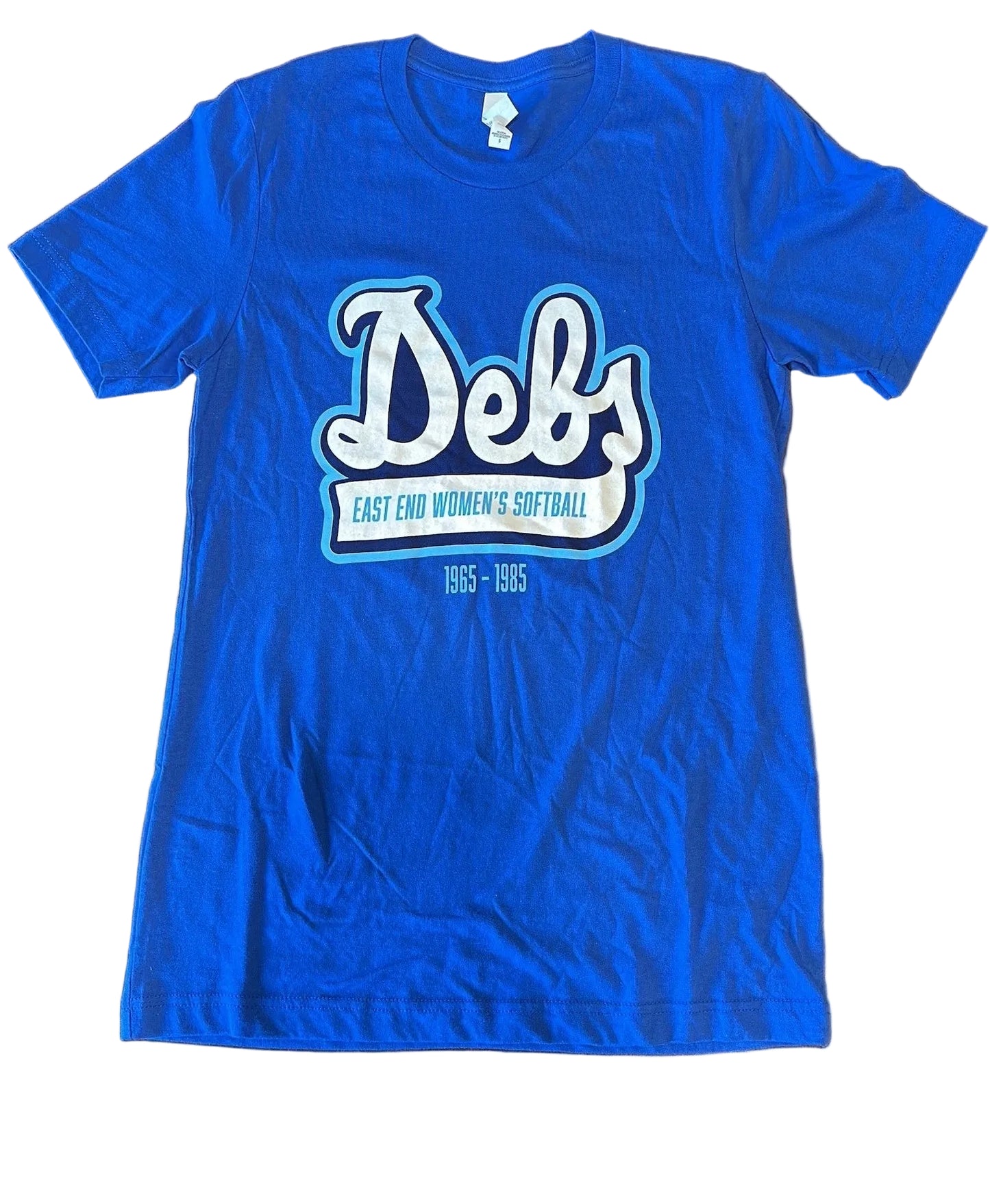 Blue t-shirt with 'Debs East End Women's Softball' text on a wooden surface