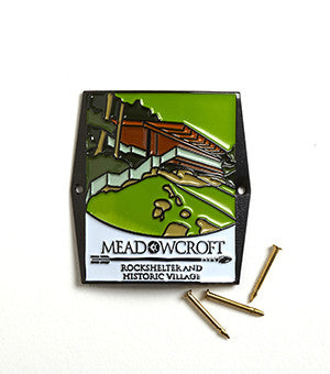 Meadowcroft Rockshelter and Historic Village badge with two pins on a white background
